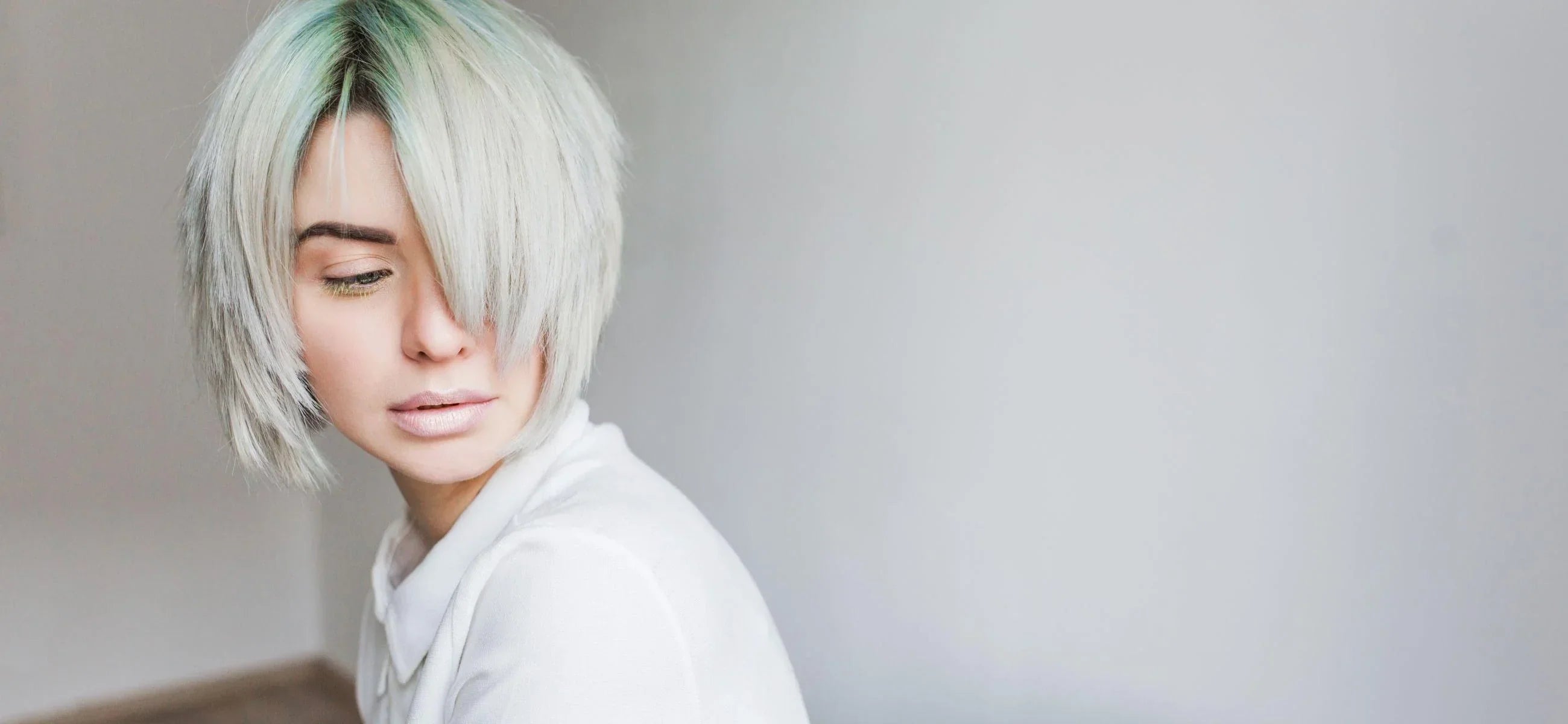 Kako popraviti poškodovane pobeljene lase