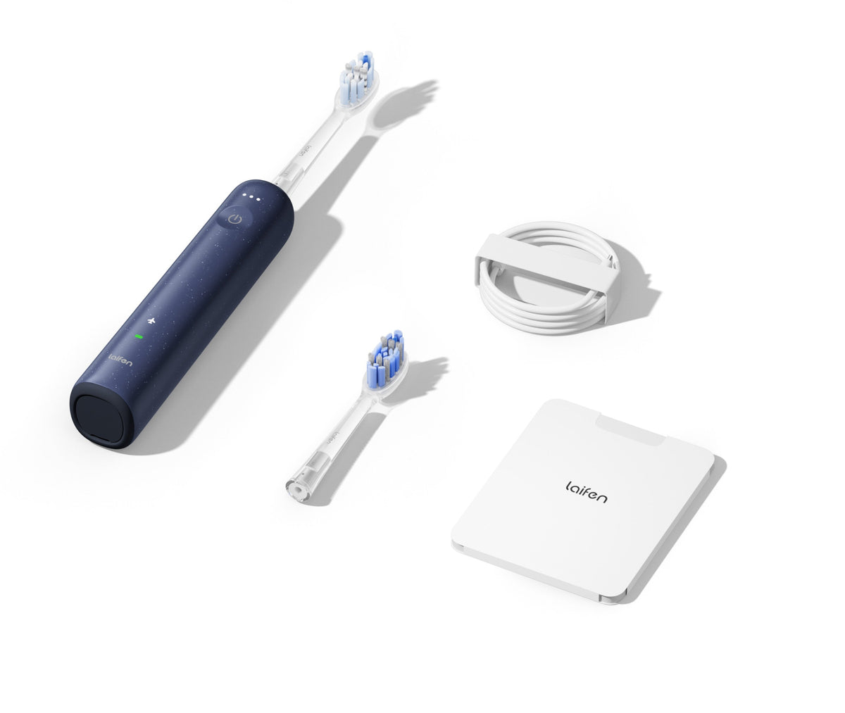 Wave Lite toothbrush, brush head, USB-C charger, and quick start guide