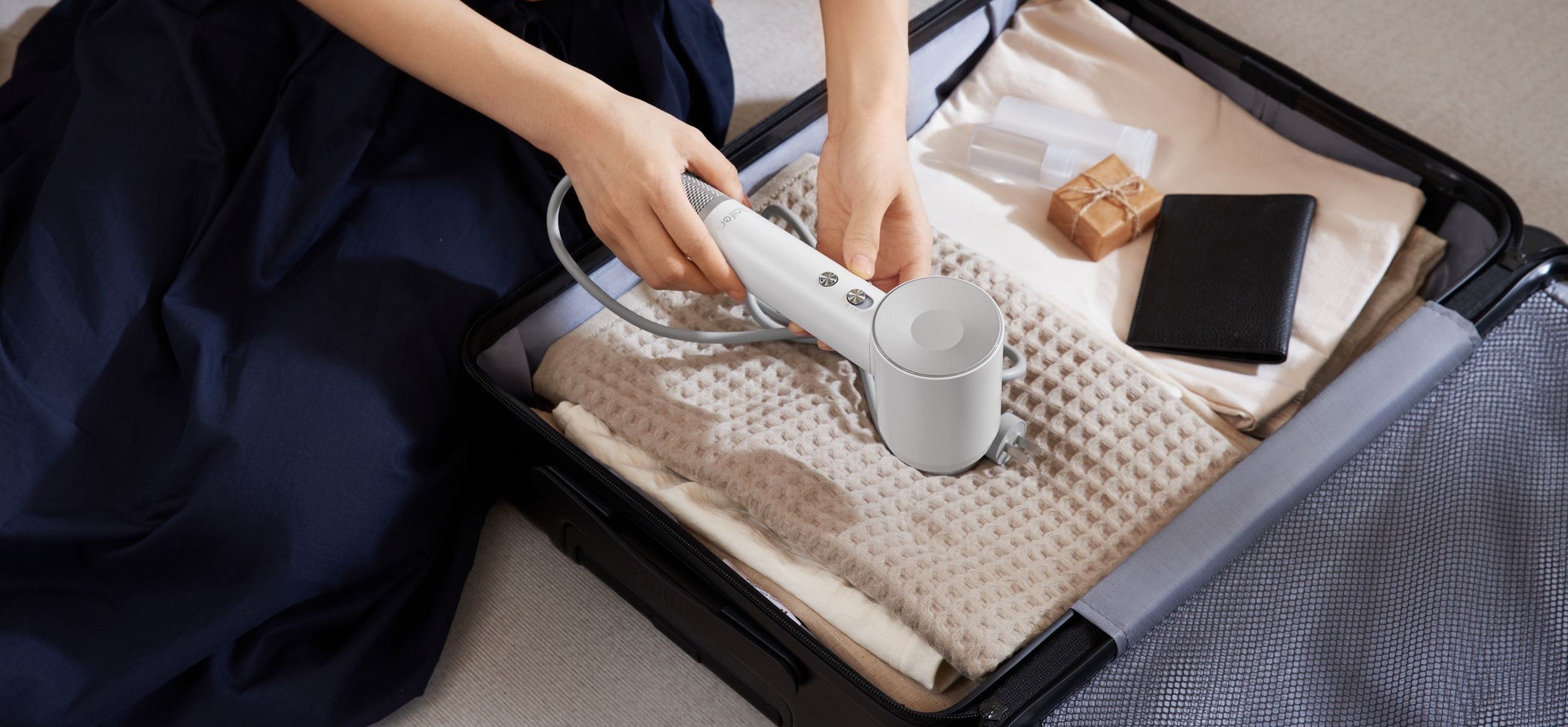 Guida all'acconciatura portatile con asciugacapelli e diffusori da viaggio